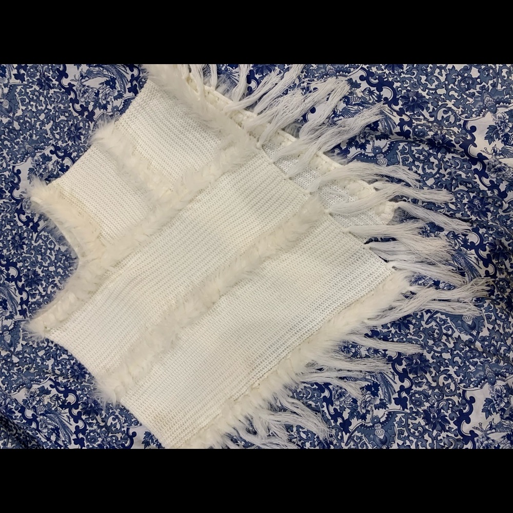 Marc’s white shawl with faux fur stripes